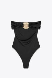 SWIMSUIT WITH A BANDEAU NECKLINE AND METAL PIECE