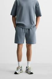 INTERLOCK TEXTURED BERMUDA SHORTS