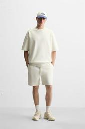 INTERLOCK TEXTURED BERMUDA SHORTS