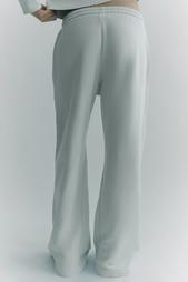 FADED WIDE-LEG TROUSERS