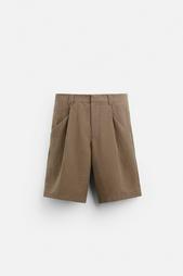 CREASED-EFFECT PLEATED BERMUDA SHORTS