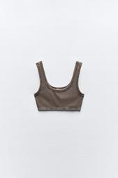 FADED-EFFECT RIBBED CROP TOP WITH RIPS