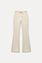 STITCHED INTERLOCK BELL BOTTOM TROUSERS