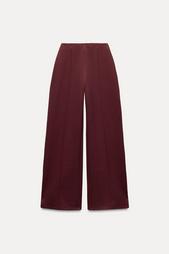 INTERLOCK KNIT TROUSERS WITH VENTS