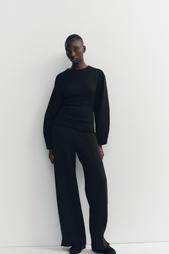 INTERLOCK KNIT TROUSERS WITH VENTS