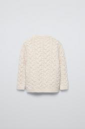 CABLE-KNIT SWEATER