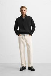 HIGH NECK QUARTER-ZIP SWEATER