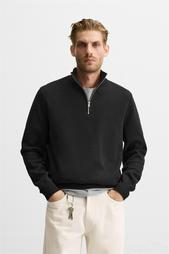 HIGH NECK QUARTER-ZIP SWEATER