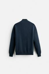 HIGH NECK QUARTER-ZIP SWEATER