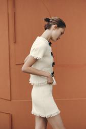FRAYED KNIT MINI SKIRT