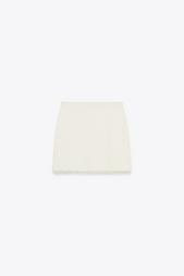 FRAYED KNIT MINI SKIRT